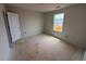 Unfinished bedroom with window provides natural light and a blank canvas for customization at 829 Ottawa Dr, Garner, NC 27529