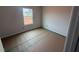 A bright bedroom features a window and clean walls ready for personalization at 829 Ottawa Dr, Garner, NC 27529