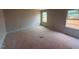 A bright bedroom with neutral walls and two windows offers a serene space at 829 Ottawa Dr, Garner, NC 27529