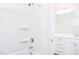 Well-lit bathroom featuring a shower-tub combo and neutral fixtures at 925 Kinglet House Rd, Knightdale, NC 27545