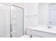 Bright bathroom featuring a glass enclosed shower and new fixtures at 925 Kinglet House Rd, Knightdale, NC 27545