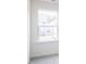 Bright bedroom featuring a large window that offers a view of the surrounding neighborhood at 925 Kinglet House Rd, Knightdale, NC 27545