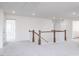 Bright loft features new carpeting and access to other rooms via doorways at 925 Kinglet House Rd, Knightdale, NC 27545
