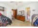 Bright bedroom with wood furniture and multiple closets at 9751 N Highway 96, Selma, NC 27576