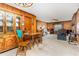 Classic dining room with wood furniture, wood-paneled walls, and vintage decor at 9751 N Highway 96, Selma, NC 27576