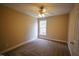 Neutral bedroom with plush carpet, ceiling fan, and bright window at 10 London Way, Spring Lake, NC 28390