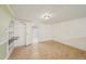 Finished basement space with tiled floors, green accent walls, and built-in shelving at 102 W Weatherspoon St, Sanford, NC 27330