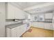 Well-lit kitchen with plenty of counter space and modern appliances at 102 W Weatherspoon St, Sanford, NC 27330