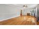 Bright living room features hardwood floors and a classic fireplace at 102 W Weatherspoon St, Sanford, NC 27330