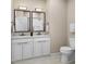 This bathroom has double sinks and a shower at 1037 Zelkova Ln, Chapel Hill, NC 27517