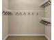 Spacious walk-in closet with multiple rods for ample storage at 1037 Zelkova Ln, Chapel Hill, NC 27517