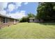 A well-maintained backyard with a detached garage at 107 Rencher St, Hillsborough, NC 27278