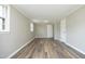 Bright bedroom features new flooring, fresh paint, and ample natural light at 107 Rencher St, Hillsborough, NC 27278