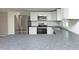 Bright kitchen featuring stainless steel appliances, white cabinetry, and stylish countertops at 107 Rencher St, Hillsborough, NC 27278