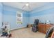 Bedroom with a blue accent stripe, carpeted floors, ceiling fan and natural lighting at 110 Oak Park Dr, Benson, NC 27504