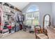 Spacious walk-in closet with custom shelving and large arched window providing ample natural light at 110 Oak Park Dr, Benson, NC 27504