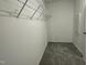 The walk-in closet has carpet, lighting, and hanging storage above at 111 Bonsai Way, Four Oaks, NC 27524