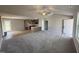 Spacious living area open to the kitchen, featuring modern flooring and a bright, airy atmosphere at 111 Coharie Dr, Lillington, NC 27546