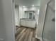 Primary bathroom features dual vanity, granite counters, soaking tub and walk-in shower at 111 Mahogany Way, Four Oaks, NC 27524