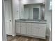 Elegant bathroom offers dual sinks, granite countertops, soaking tub, and separate shower at 111 Mahogany Way, Four Oaks, NC 27524