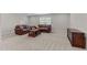 Large finished basement area with natural light and comfortable seating at 1112 Monterey Bay Dr, Wake Forest, NC 27587