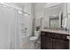 Full bathroom with a shower-tub combo and granite countertop at 1112 Monterey Bay Dr, Wake Forest, NC 27587