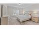 Cozy bedroom with a neutral color palette and carpet flooring at 1112 Monterey Bay Dr, Wake Forest, NC 27587