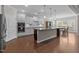 Gourmet kitchen featuring a large island and modern stainless steel appliances at 1112 Monterey Bay Dr, Wake Forest, NC 27587