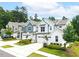 View of the house showing the lawn and garage with landscaping and nice walkways at 1240 Gemfor St, Durham, NC 27703