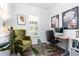 Stylish home office featuring an ergonomic chair, modern desk, and serene natural light at 1240 Gemfor St, Durham, NC 27703