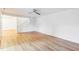 Open concept living room features hardwood floors and stairs leading to a second floor at 127 Finley Forest Dr, Chapel Hill, NC 27517