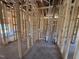 Unfinished bathroom with visible plumbing and framing, ready to be transformed into a modern space at 136 Tuskeegee Dr, Smithfield, NC 27577