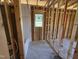 Bathroom under construction shows the framing and plumbing before the walls are up at 136 Tuskeegee Dr, Smithfield, NC 27577