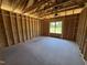 Bedroom under construction shows the framing and structure before the walls are up at 136 Tuskeegee Dr, Smithfield, NC 27577