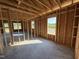 An image showcasing the framing of the interior, highlighting its structural design of new home at 136 Tuskeegee Dr, Smithfield, NC 27577