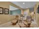 Basement with seating and framed newspaper articles for added visual interest at 137 Cofield Cir, Durham, NC 27707
