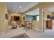 Carpeted basement with seating and a pass-through window to another room at 137 Cofield Cir, Durham, NC 27707