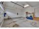 Spacious garage with concrete floors, stairs and plenty of storage space at 137 Cofield Cir, Durham, NC 27707