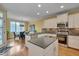 Modern kitchen with stainless steel appliances, granite counters, and breakfast nook at 137 Cofield Cir, Durham, NC 27707