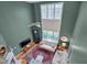Bright, two story living room with a fireplace and tall windows providing abundant natural light at 137 Cofield Cir, Durham, NC 27707
