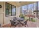 Covered patio with brick flooring and outdoor seating perfect for relaxing or entertaining at 137 Cofield Cir, Durham, NC 27707