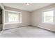 Bedroom featuring neutral paint, carpeted floors, a ceiling light, and natural lighting at 1405 Kenbrook Dr, Garner, NC 27529