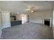 Bright, open-concept living room flows seamlessly into the kitchen, great for entertaining at 152 Tulipfield Way, Benson, NC 27504