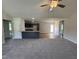 Bright, open-concept living room flows seamlessly into the kitchen, great for entertaining at 152 Tulipfield Way, Benson, NC 27504