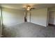 Large main bedroom features two windows, ceiling fan and ensuite bathroom at 152 Tulipfield Way, Benson, NC 27504