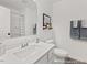 Bright bathroom with a white vanity, neutral-colored walls, and a shower and tub combination at 157 N District Ave # 291, Clayton, NC 27527
