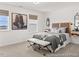 Bedroom featuring a large window, a platform bed, and a seating bench at 157 N District Ave # 291, Clayton, NC 27527