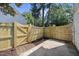 Fenced back yard with privacy fence and small concrete patio area at 1602 Township Cir, Raleigh, NC 27609