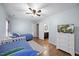 Bedroom with two twin beds and ensuite bathroom offers a relaxing and convenient space at 1602 Township Cir, Raleigh, NC 27609