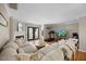 Comfortable living room featuring a fireplace, ample seating, and access to the outdoor patio at 1602 Township Cir, Raleigh, NC 27609